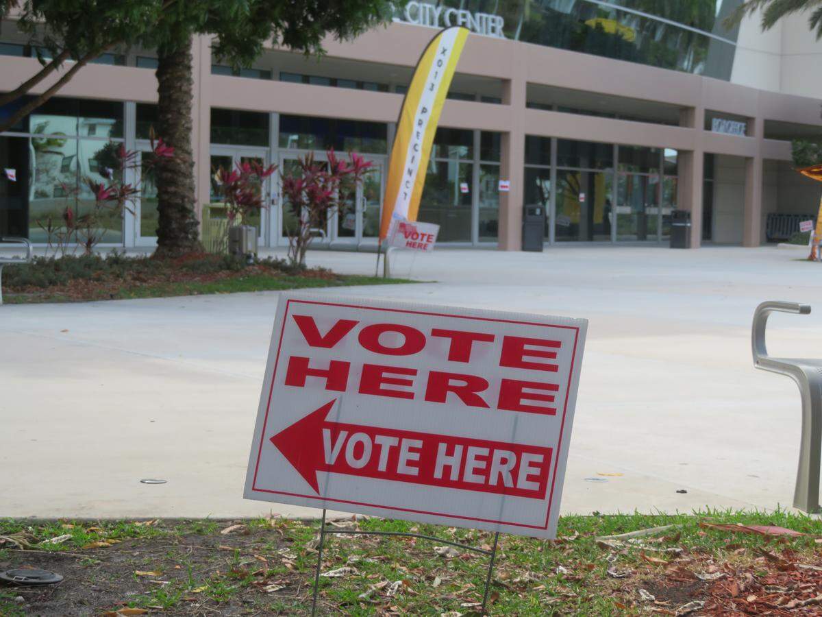 “Vote Here” signs outside the Charles F. Dodge City Center polling site for the municipal election.