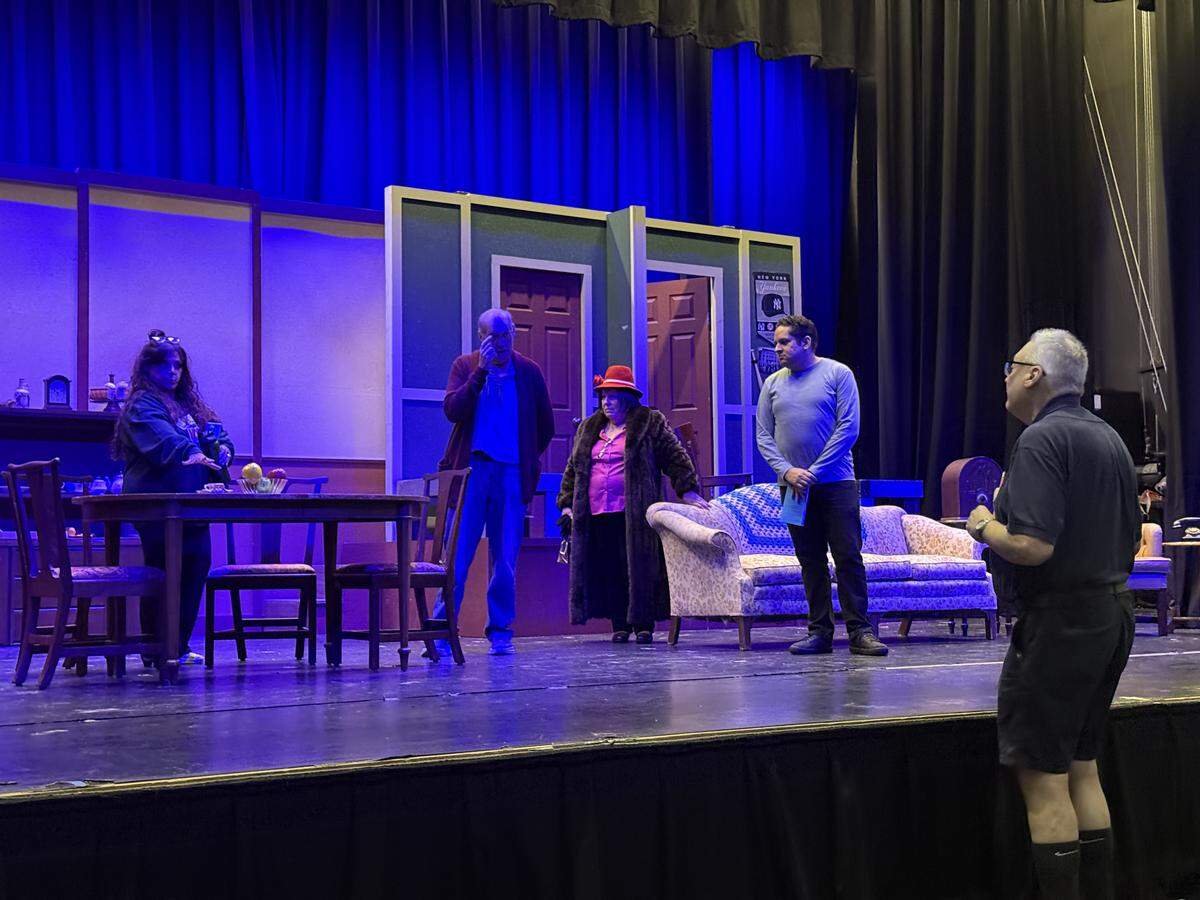 Director Jerry Jensen speaks with cast members as they prepare during “Broadway Bound” rehearsals.