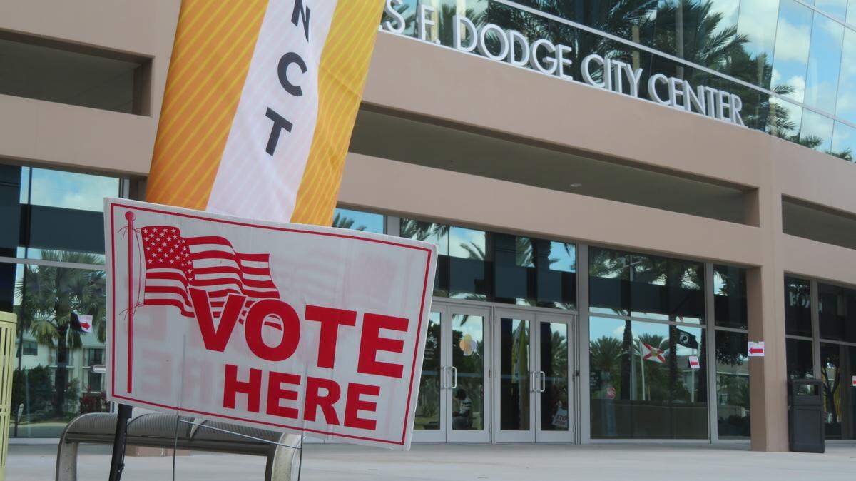 A “Vote Here” sign outside the Charles F. Dodge City Center polling site for the Tuesday, March 10, municipal election in Pembroke Pines.