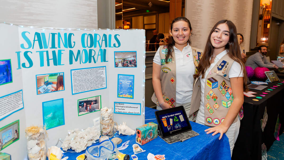 Girl Scouts Sofia Pestana and Sophia Garcia with their project, ‘Saving Corals is the Moral.’