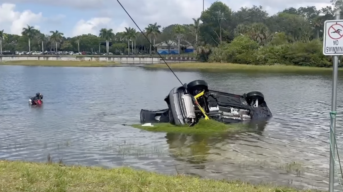 The vehicle is shown being extracted by the Pembroke Pines Police Department “dive team” from a canal inside of C.B. Smith Park on Sunday, May 24.