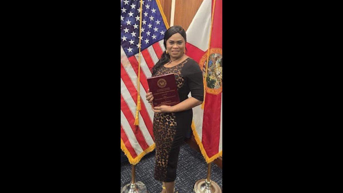 Pembroke Pines Police victim advocate Rose Desmornes honored with her plaque at the Attorney General’s Distinguished Victim Services Award ceremony in Tallahassee on April 22.