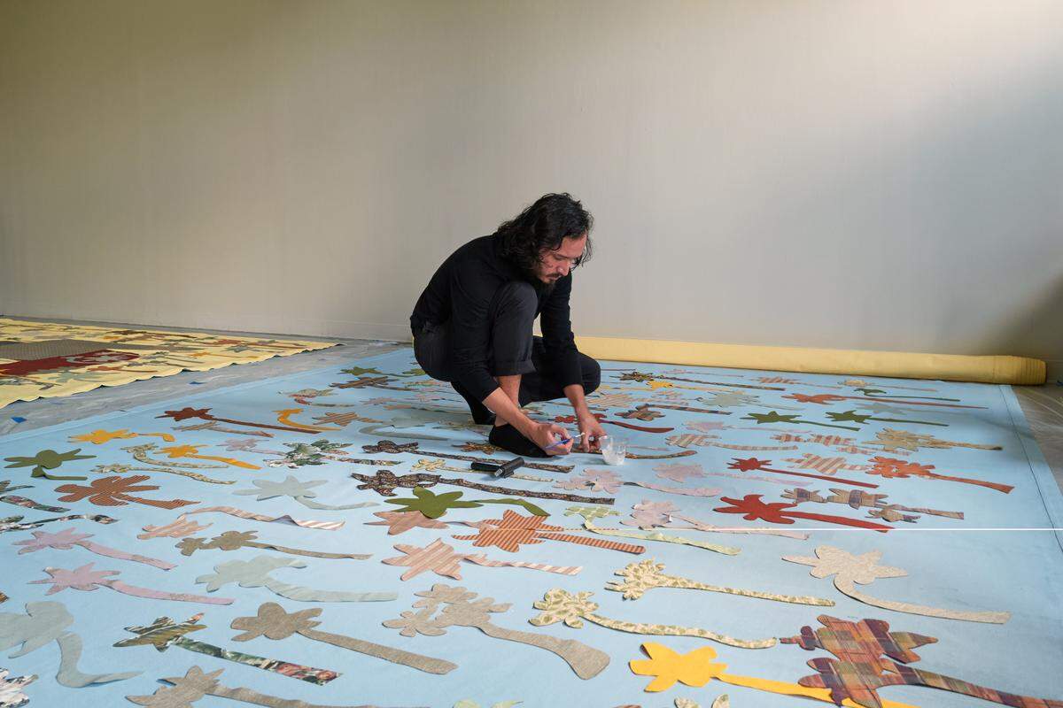 Edison Peñafiel at work on his 2021 summer residency exhibition at the McColl Center in North Carolina.