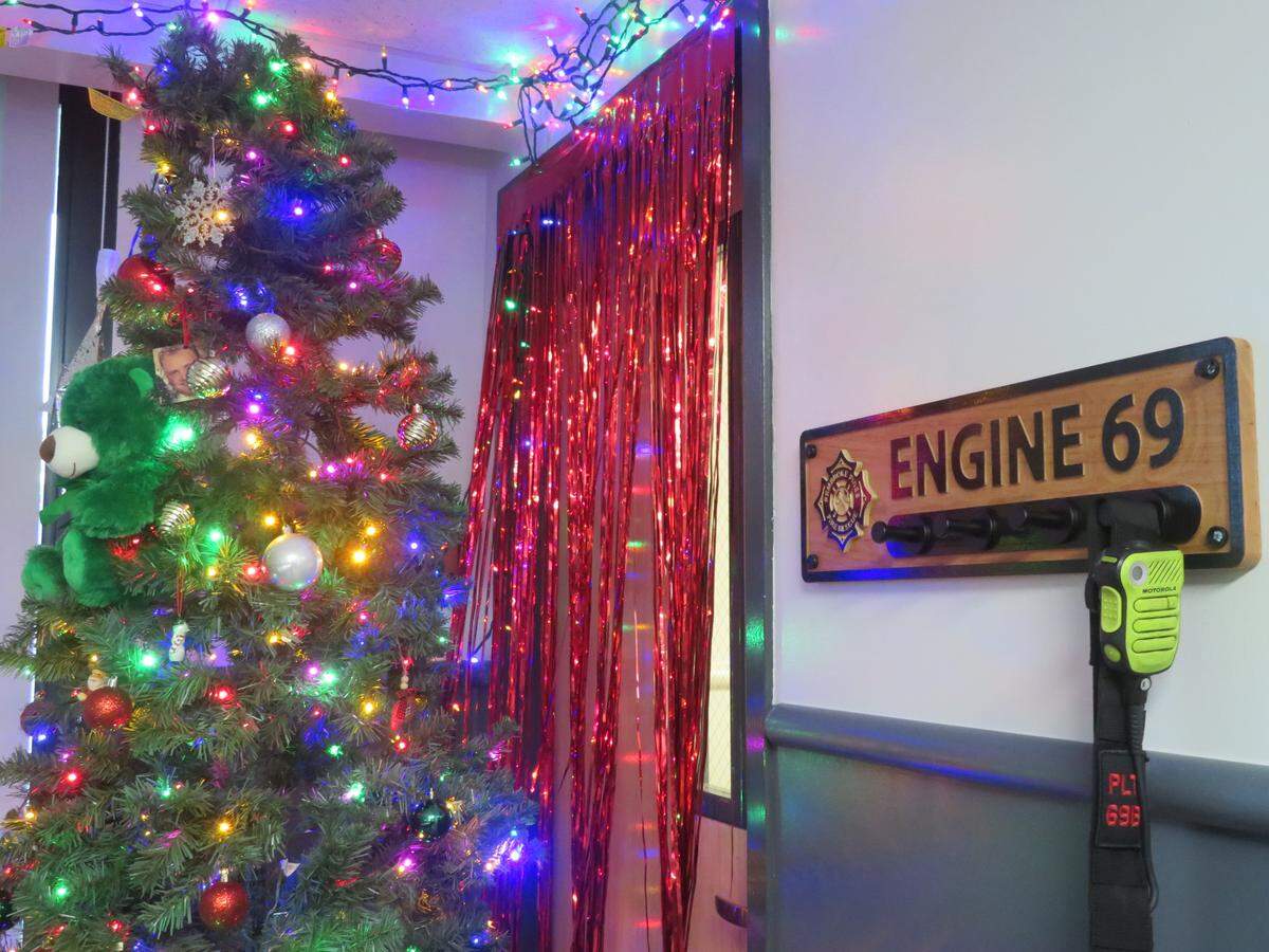 The dining and kitchen space at Station 69 in Pembroke Pines decked out for Christmas, a spot for firefighters to gather during the holiday season.