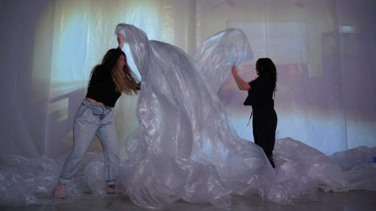 Denise Treizman, left, and Julia Zurilla, right at “Monumentalizing the Trace,” the Frank C. Ortis Art Gallery’s newest exhibition.