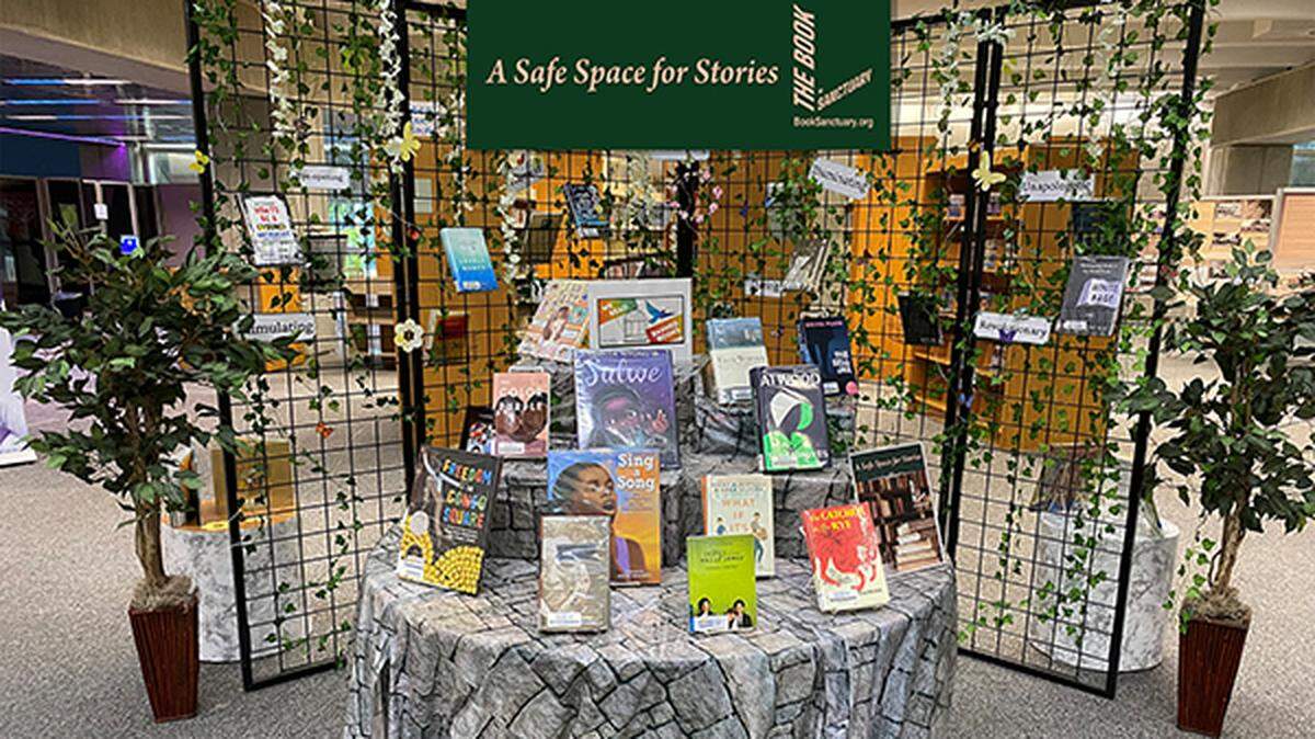 A display of books at the Broward County Library for Banned Books Week in 2025.
