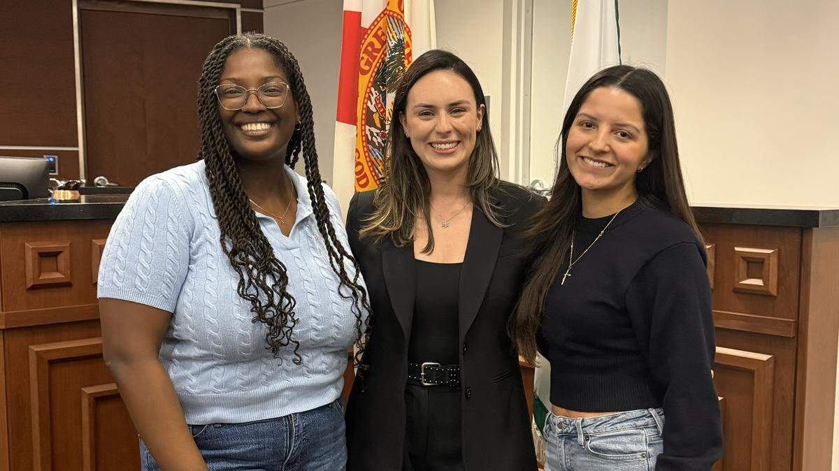 Imari Sanchez, left, Commissioner Maria Rodriguez, center, and Camila Leon, City of Pembroke Pines high school intern, right.