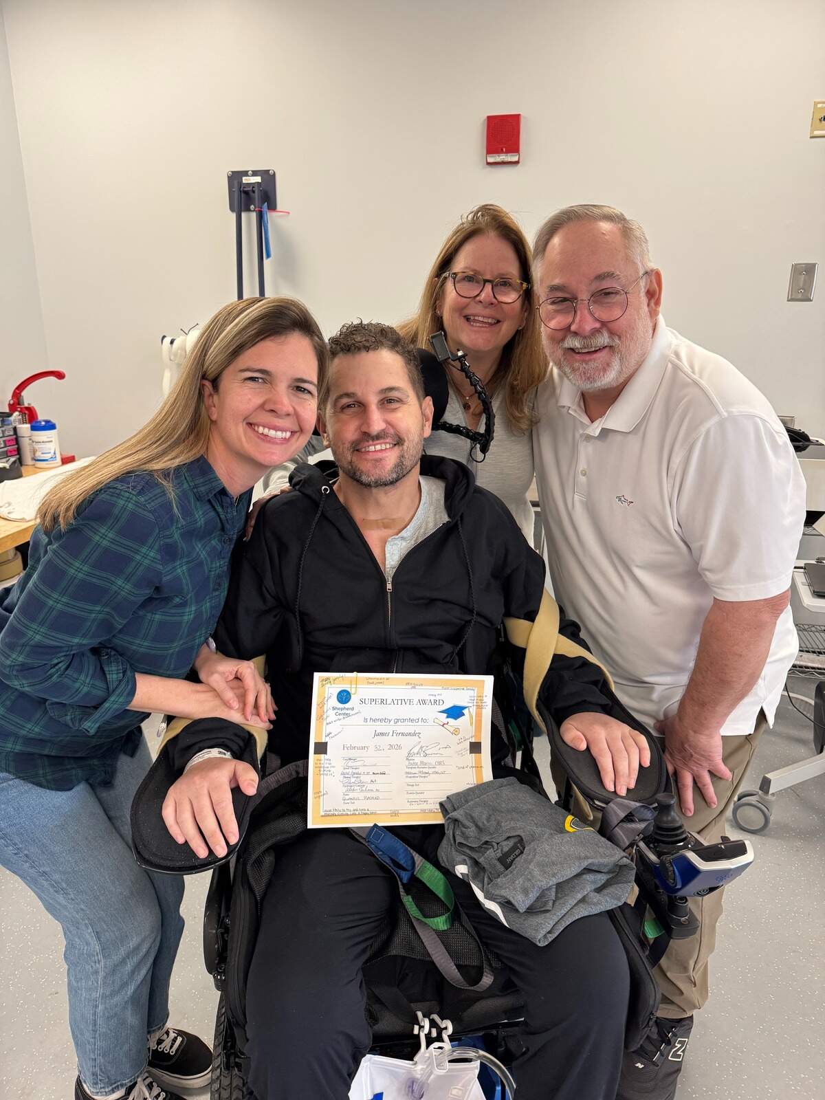From left to right, Alexis Fernandez, James Fernandez and his parents.