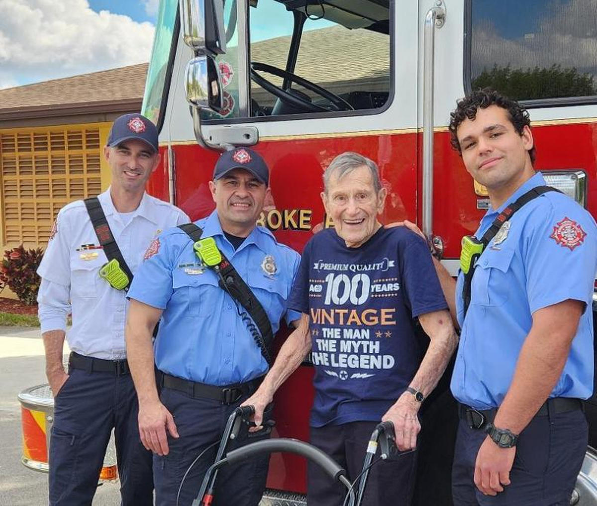 Daniel Stromer, second from right, celebrates his 100th birthday with the Pembroke Pines Fire Department.