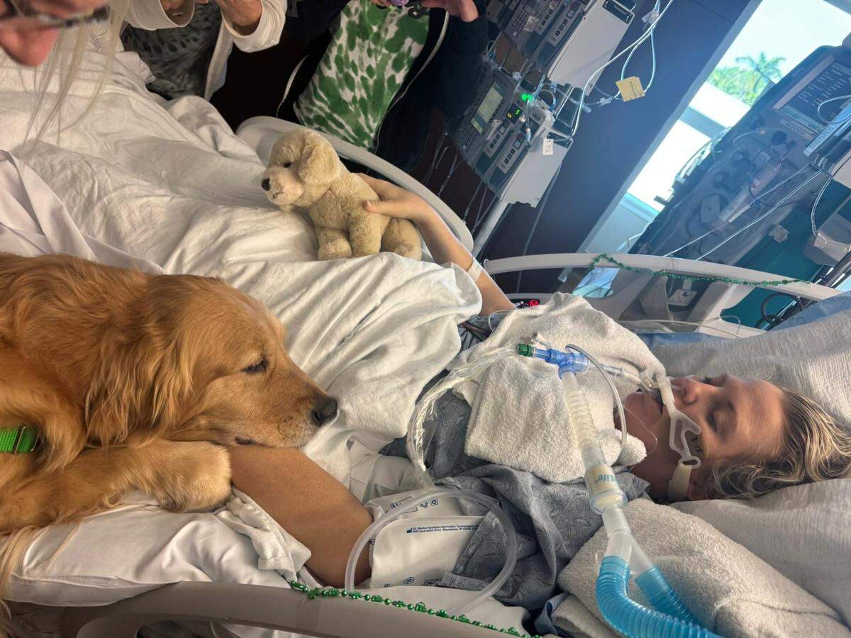 Priscilla Timmons is visited by Memorial Hospital West’s animal assisted therapy program while hospitalized.