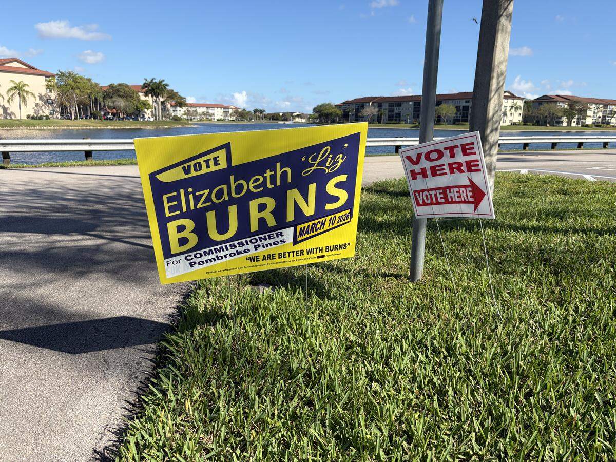 A campaign sign for District 4 candidate Elizabeth Burns at the Century Village Clubhouse, 13460 SW 10th St.