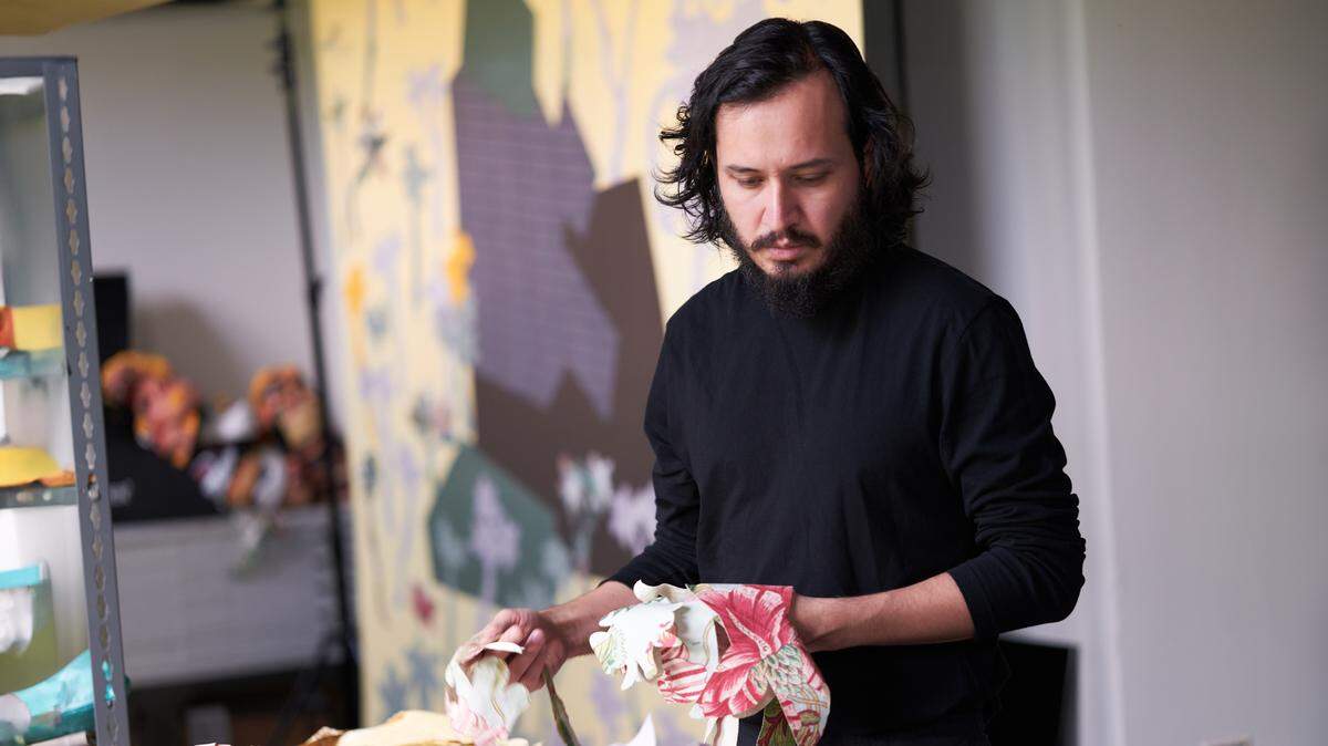 Edison Peñafiel works on his exhibition Me pongo el sol al hombro y el mundo es amarillo, during a summer residency at the McColl Center for Art + Innovation in Charlotte, North Carolina, in 2021.