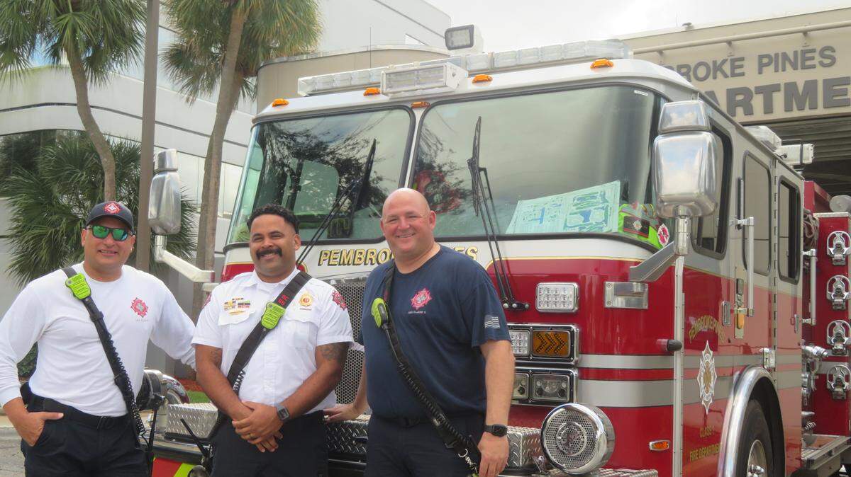 Pembroke Pines firefighters (from left) Capt. Moe Martinez, Capt./Battalion Chief Steven March and Driver Engineer Sean Gilmartin are pictured at Station 69 on Dec. 19.